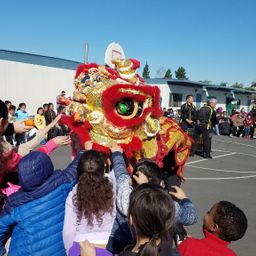 Students enjoy the dragon dancers at the school's Lunar New Year celebration!