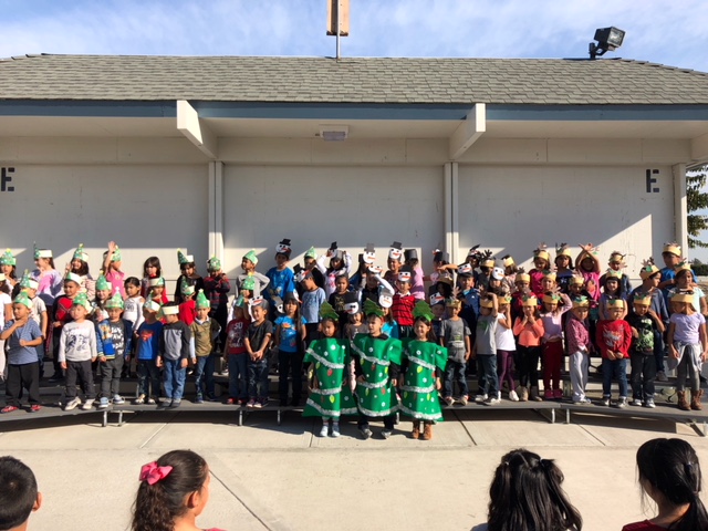 Students come together to sing festive songs. It's a holiday performance to remember!